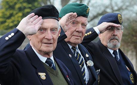 The chairman of the Wiltshire branch of the Normandy Veterns' Association, Bob Conway, Centre with Bert Williams (L) and Wally Beall (R)13 Feb 2009 See SWNS Story SWWAR D-Day heroes condemned the Government after it refused to pay for them to attend the forthcoming 65th anniversary of the landings. Thousands of World War II veterans had hoped to make the pilgrimage to Normandy in June this year and join together in remembrance of the dead. Every American and Canadian soldier who fought in the landings has their travel and hotel expenses paid for each year by their still-grateful nations. But it has emerged that the British Government has refused to grant any financial aid to the war heroes who fought for our freedom - until 2044. Many veterans - most now well into their 80s and 90s - fear the 65th anniversary could be their last chance to join together in remembrance. They are now being forced to collect charity donations on the streets in a desperate attempt to ensure that no soldier who wants to go misses out.